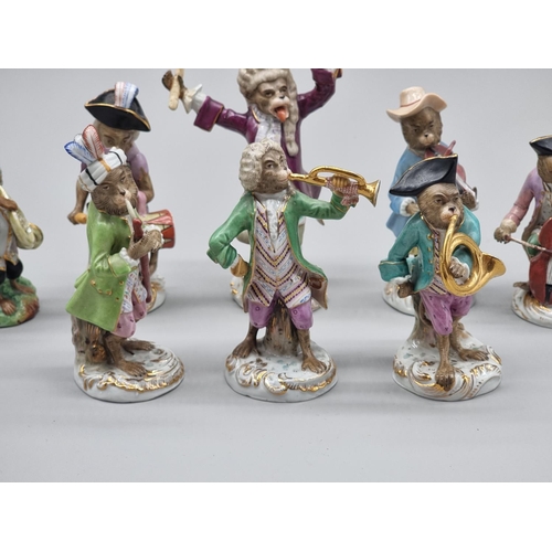 1474 - A set of nine Dresden porcelain 'Monkey Band' figures, largest 17cm high; together with another smal... 