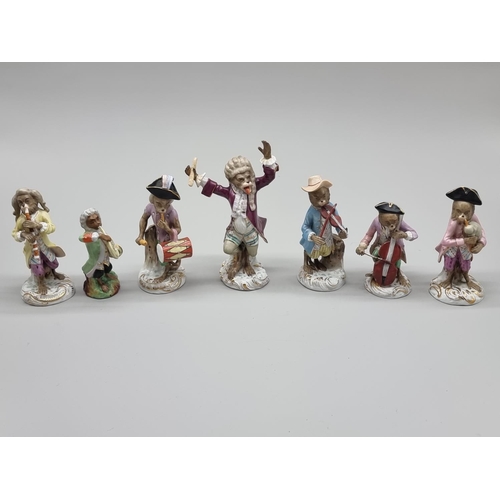 1474 - A set of nine Dresden porcelain 'Monkey Band' figures, largest 17cm high; together with another smal... 