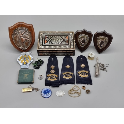 1482 - A mixed lot, to include Red Cross badges; AA car radiator badge; bosun's whistle etc.  ... 