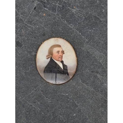 1495 - British School, late 18th century, bust length portrait miniature of a gentleman with a black jacket... 