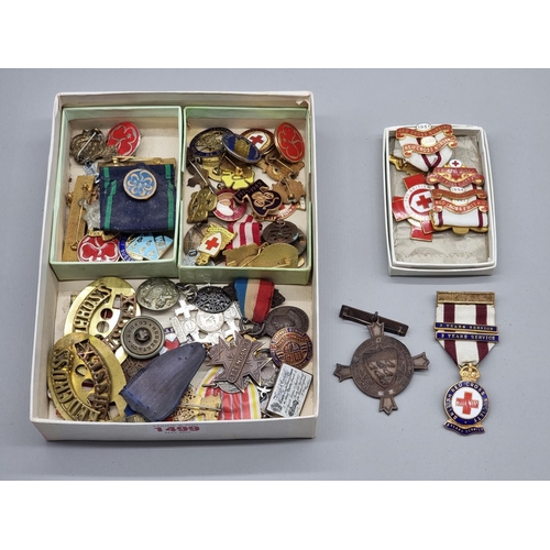 1499 - A collection of Red Cross and other similar medals and badges. 