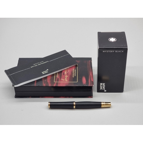 1501 - A Montblanc limited edition 'Virginia Woolf' fountain pen, boxed, together with a Montblanc ink bott... 