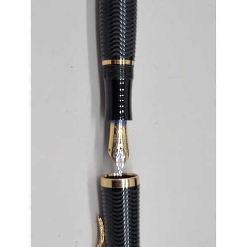 1501 - A Montblanc limited edition 'Virginia Woolf' fountain pen, boxed, together with a Montblanc ink bott... 