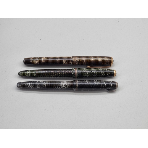 1506 - Three Parker Vacumatic fountain pens, each with 14K nibs, (one with broken pocket clip).... 