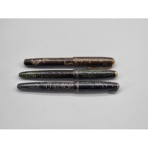 1506 - Three Parker Vacumatic fountain pens, each with 14K nibs, (one with broken pocket clip).... 