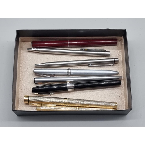 1519 - Eight Sheaffer pens, to include a gilt 'Targa' fountain pen, with 14K nib. (8)