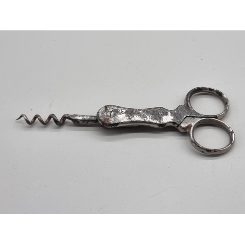 1527 - A vintage Perrier Jouet corkscrew, total length 13.5cm. 