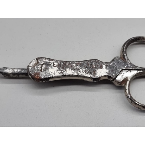 1527 - A vintage Perrier Jouet corkscrew, total length 13.5cm. 