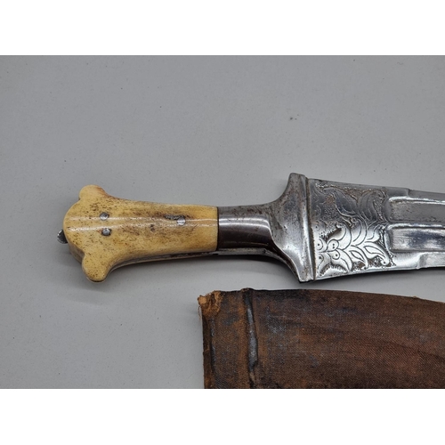 1532 - An Arab jambiya and sheath, with 20cm blade and bone scales; together with a vintage antler handled ... 