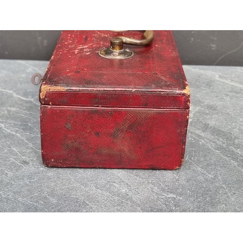 1534 - A rare Victorian red leather 'War Office' dispatch box, with crown and VR cypher, inscribed 'Wickwar... 