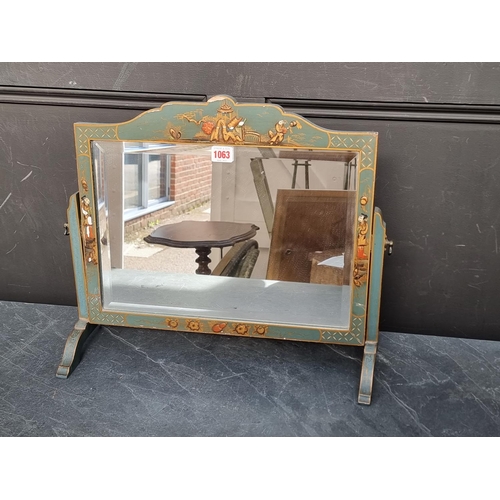 1063 - An early 20th century green chinoiserie toilet mirror, 48.5cm wide.