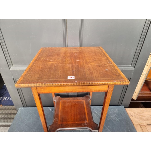 1067 - An Edwardian mahogany and inlaid square occasional table, 48cm wide. 