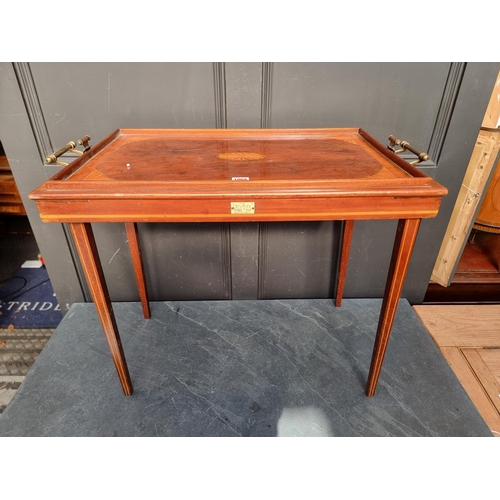 1068 - An Edwardian mahogany and inlaid folding table, bearing ivory plaque inscribed 'The Osterley Table T... 