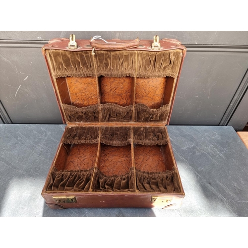 1219 - An unusual 1930s Harrods leather shoe case, 43.5cm wide.