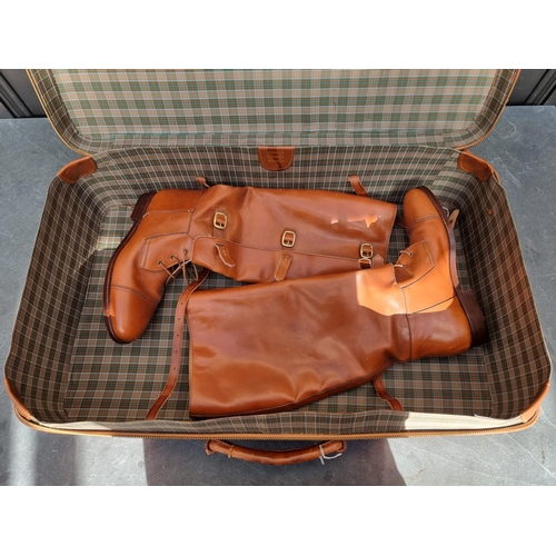 1220 - A pair of tan leather military officers style boots; in tan leather suitcase.