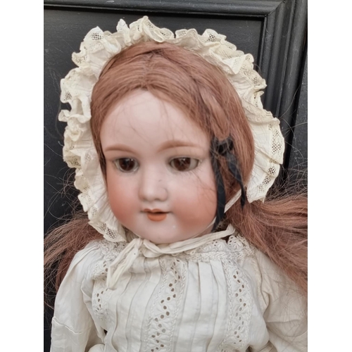 1460 - Dolls: an Armand Marseille 390 doll; together with a Max Handwerck example. (2)