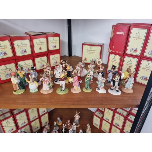 1573 - A very large collection of Royal Doulton 'Bunnykins' figures, approx 89; together with two related s... 