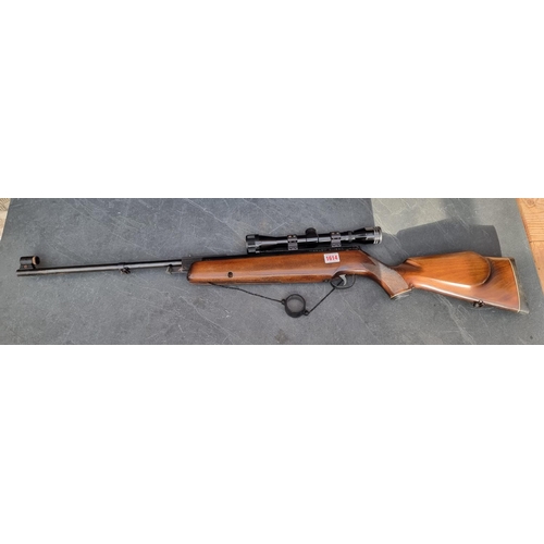 1614 - A Webley Omega .22 cal break action air rifle, Serial No.825952, with Nikko Stirling 4x32 scope.Plea... 