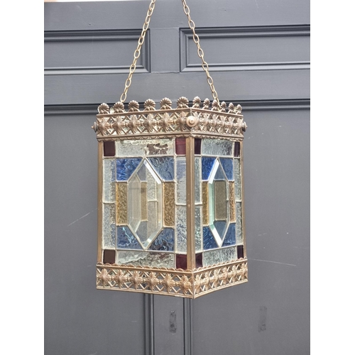 1581 - An old brass and stained leaded glass ceiling lantern, 33cm high x 20cm wide.