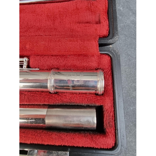 1593 - A Yamaha YFL221S electroplated flute, in fitted case.