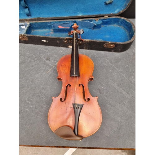 1601 - A violin, with 13in one-piece back, in ebonized case.