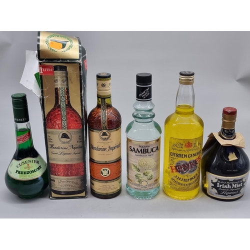 101 - A 1 litre bottle of Mandarine Napoleon, in card box; together with another 70cl example; a 1 litre b... 