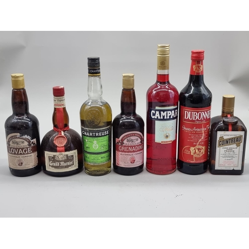 103 - A group of Liqueurs and similar, to include: a 70cl Chartreuse Green, (seal broken); a 70cl Grand Ma... 