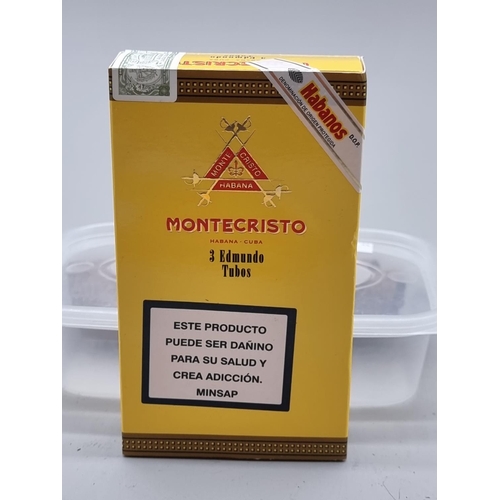 114 - Cigars: a sealed box of three Montecristo 'Edmundo Tubos'; together with a sealed box of ten Montecr... 