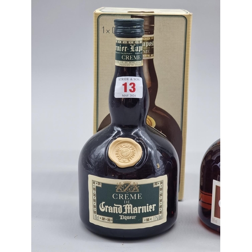 13 - A 70cl bottle of Creme de Grand Marnier, in card box; together with a 50cl bottle of Grand Marnier, ... 