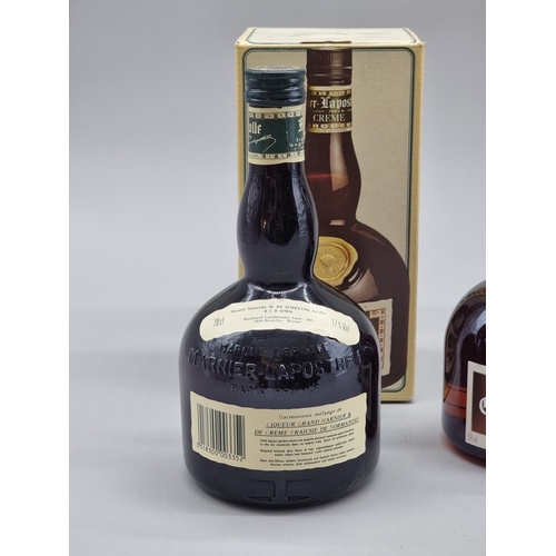 13 - A 70cl bottle of Creme de Grand Marnier, in card box; together with a 50cl bottle of Grand Marnier, ... 