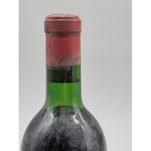 26 - A 75cl bottle of Chateau Cabonnieux, Graves de Leognan, 1961.