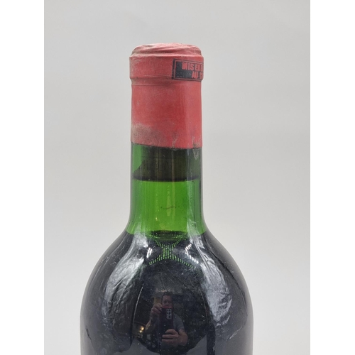 26 - A 75cl bottle of Chateau Cabonnieux, Graves de Leognan, 1961.