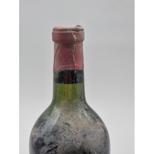 27 - A bottle of Chateau Grand-Puy-Ducasse, Pauillac, 1955.