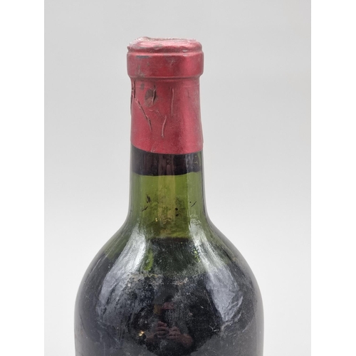 27 - A bottle of Chateau Grand-Puy-Ducasse, Pauillac, 1955.