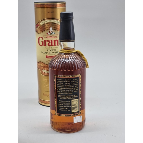 30 - A 1 litre bottle of Southern Comfort 'Reserve'; together with a 70cl bottle of Grant's blended Whisk... 