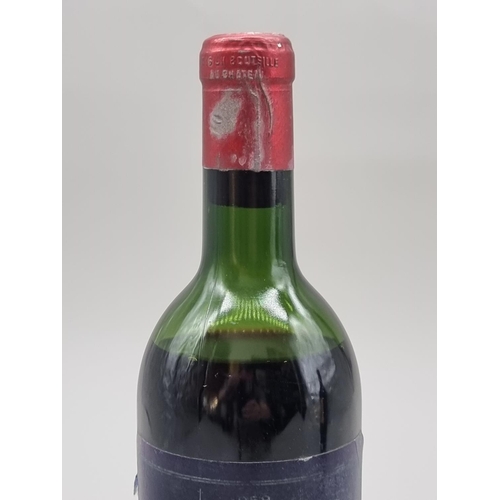 32 - A 75cl bottle of Chateau Palmer, 1959, Margaux, (mid shoulder level).