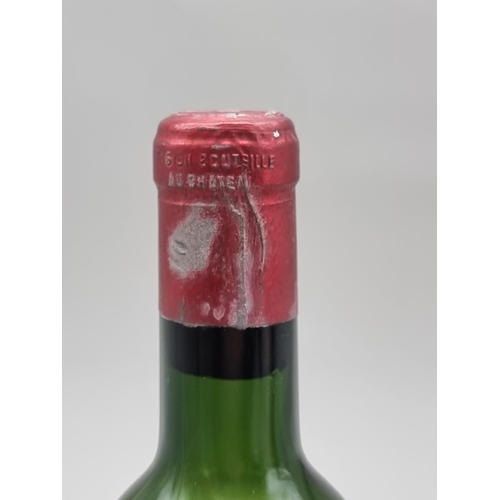 32 - A 75cl bottle of Chateau Palmer, 1959, Margaux, (mid shoulder level).