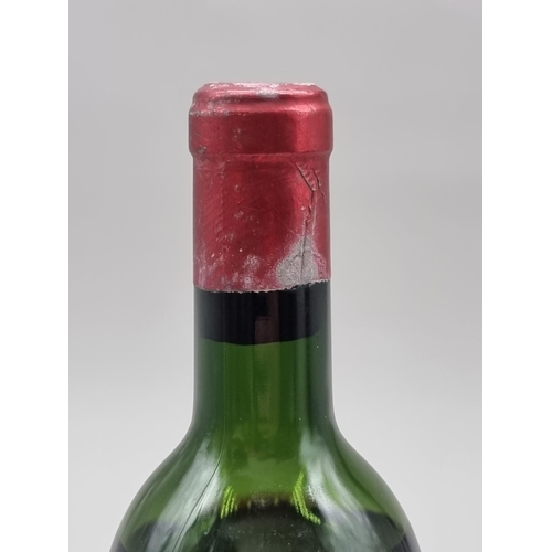 32 - A 75cl bottle of Chateau Palmer, 1959, Margaux, (mid shoulder level).