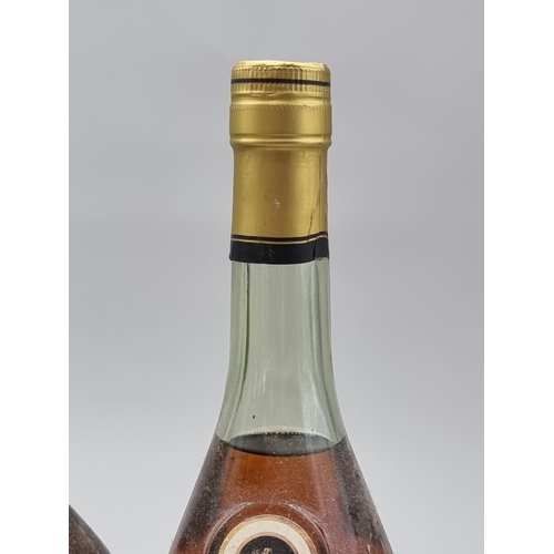 38 - A 1 litre bottle of Martell VS Cognac; together with a 70cl bottle of VSOP Armagnac; and a 70cl... 