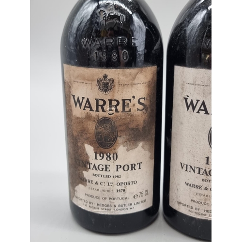 56 - Two 75cl bottles of Warre's 1980 Vintage Port, bottled 1982. (2)