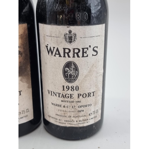 56 - Two 75cl bottles of Warre's 1980 Vintage Port, bottled 1982. (2)