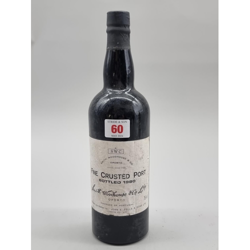 60 - A bottle of Smith, Woodhouse & Co Fine Crusted Port, bottled 1980.