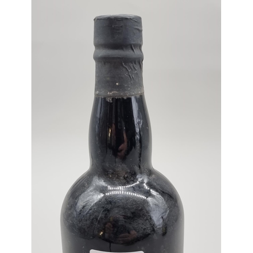 60 - A bottle of Smith, Woodhouse & Co Fine Crusted Port, bottled 1980.