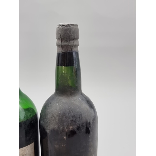 62 - A bottle of Warre's 1970 Vintage Port, (low shoulder level); together with another old bottle of Por... 