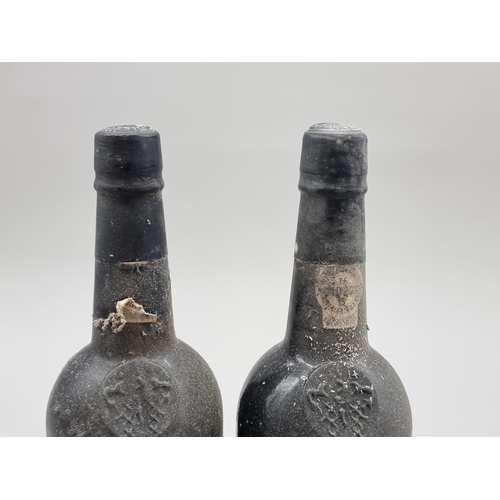 64 - Two 75cl bottles of Fonseca's Finest 1977 Vintage Port. (2)