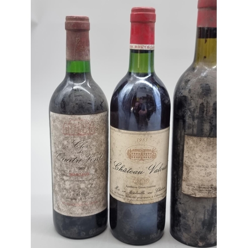 84 - An interesting group of French vintage red Wines, comprising: Chateau Palmier, Saint Estephe, 1982; ... 