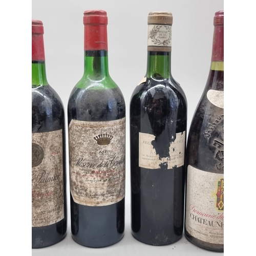 84 - An interesting group of French vintage red Wines, comprising: Chateau Palmier, Saint Estephe, 1982; ... 