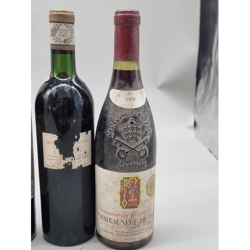 84 - An interesting group of French vintage red Wines, comprising: Chateau Palmier, Saint Estephe, 1982; ... 