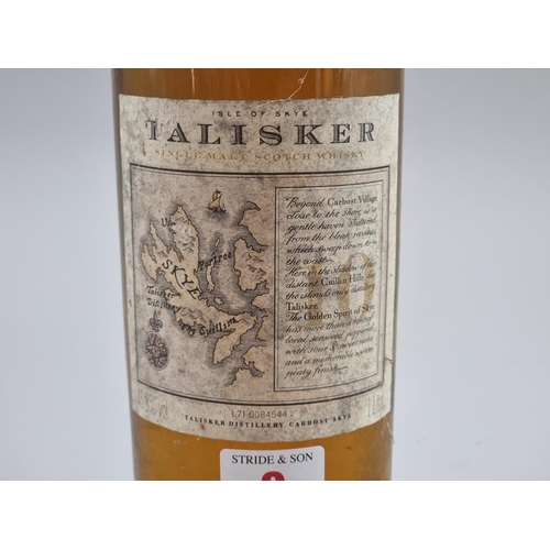 9 - A 1 litre bottle of Talisker 10 Year Old Whisky, old style map label, 45.8% abv, (damage to capsule ... 