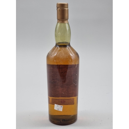 9 - A 1 litre bottle of Talisker 10 Year Old Whisky, old style map label, 45.8% abv, (damage to capsule ... 